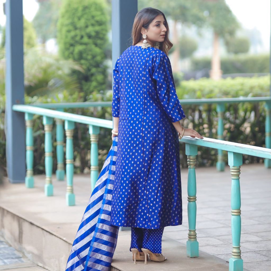 Back profile of the blue silk salwar suit showing the fit and weave consistency.