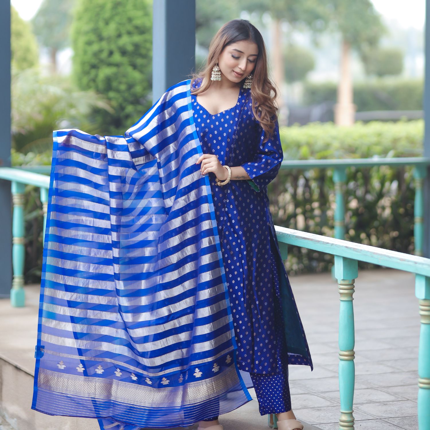 blue silk salwar suit showing the fit and weave consistency.