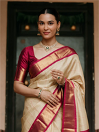 Shop the luxury Handwoven Kanjivaram Silk Saree in Crimson Red & Warm Gold at Arzoindia. Features a grand woven zari border, ideal for weddings & festive occasions.
