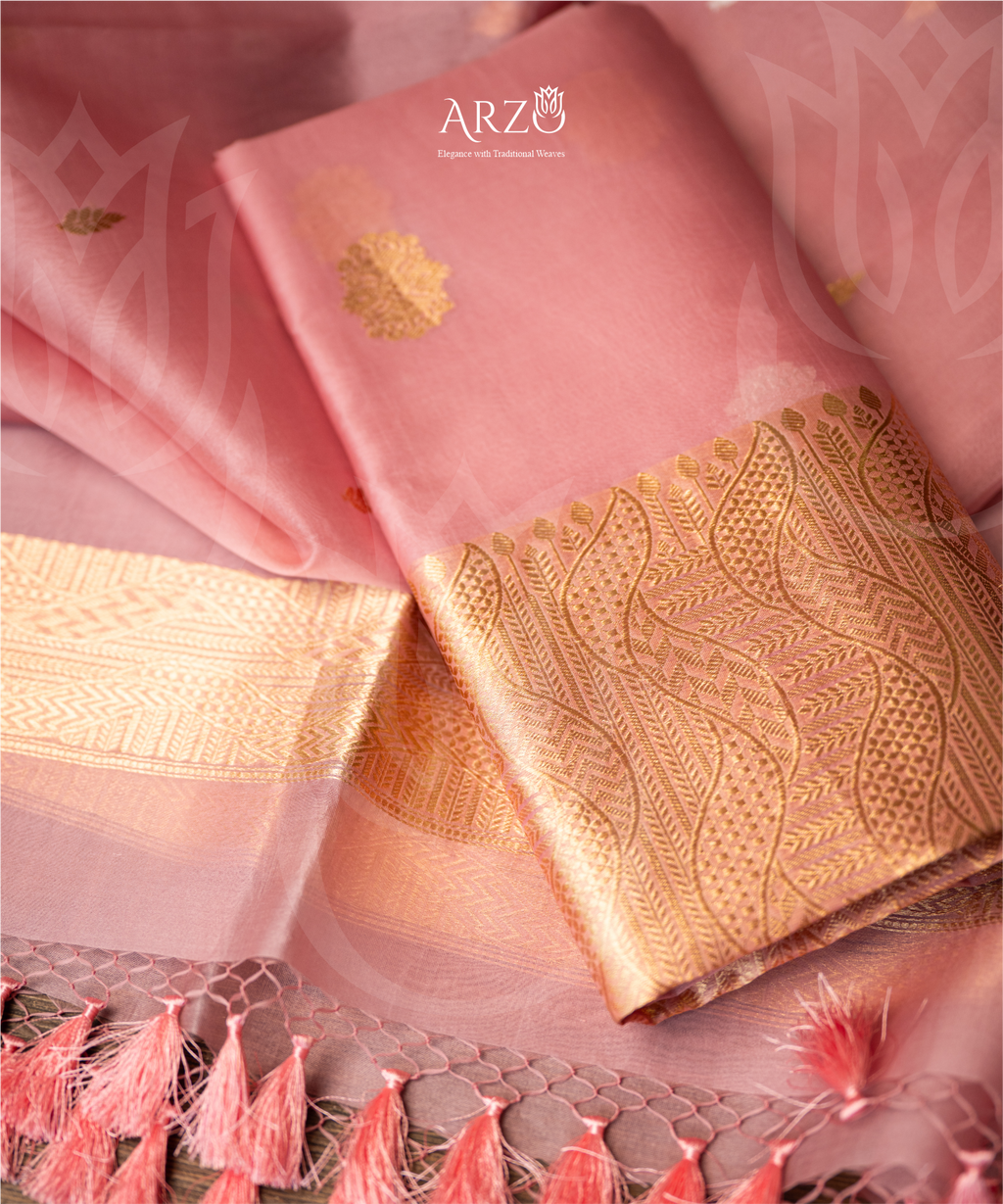 Handwoven Kora silk suit with rich zari weaving, lightweight premium festive wear for weddings and special occasions