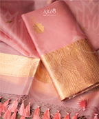 Handwoven Kora silk suit with rich zari weaving, lightweight premium festive wear for weddings and special occasions