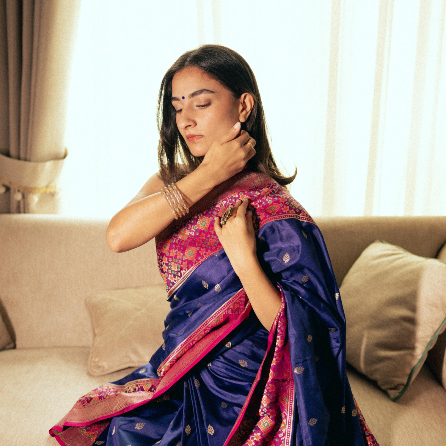 Traditional Banarasi silk saree with intricate weaving, Patola pallu and contrast blouse