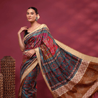 Arzo India Royal Plum Tussar silk saree featuring traditional Kantha embroidery paired with a black sleeveless blouse.