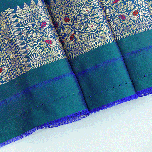 Full flat layout of the handwoven Azure Meenakari Majesty Katan Silk Saree showing its vibrant colors and royal craftsmanship.