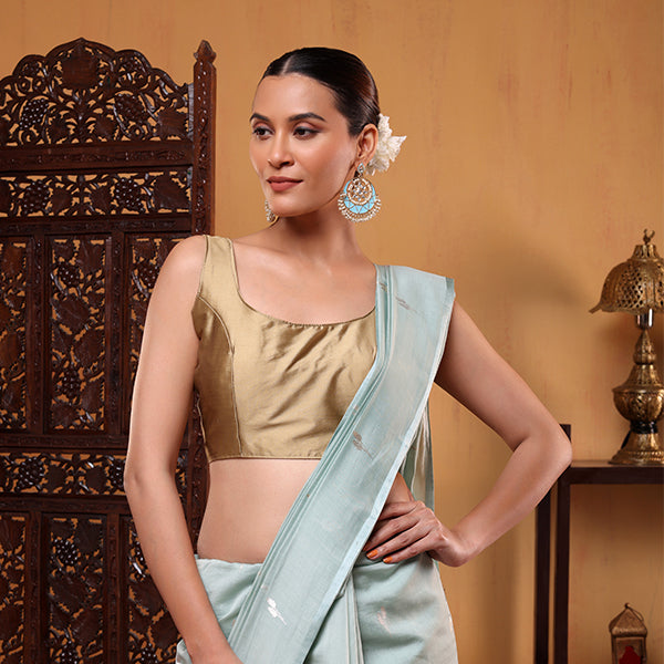 Detailed view of the vibrant pastel green Banarasi cotton saree showcasing the intricate handwoven Kalanga Aanchal design in silver and gold zari.