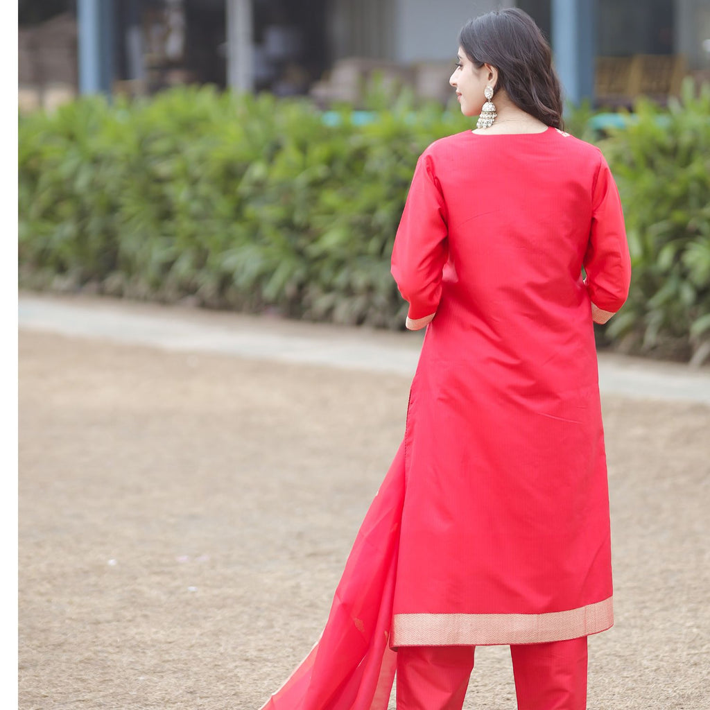 Classic red Banarasi silk suit with rich texture and ethnic style