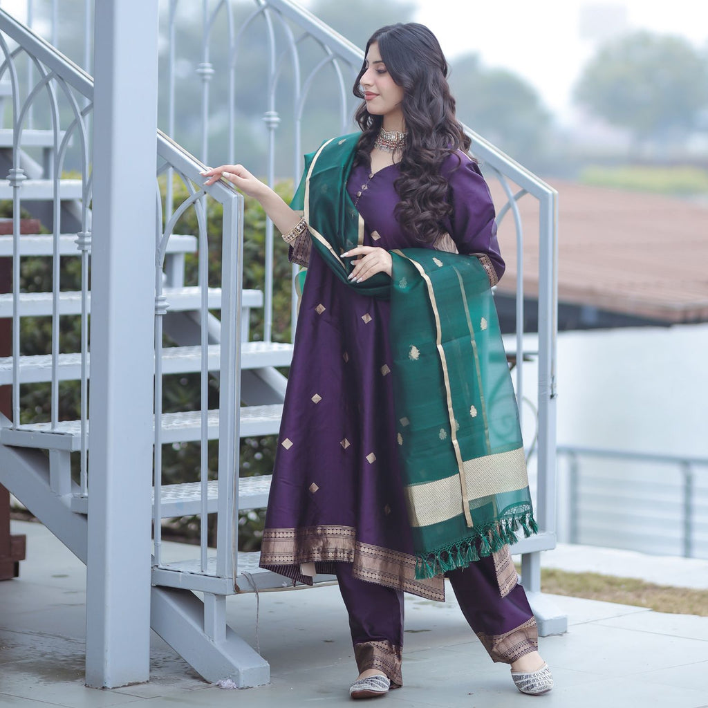 Banarasi silk suit with green kora dupatta and traditional woven pattern