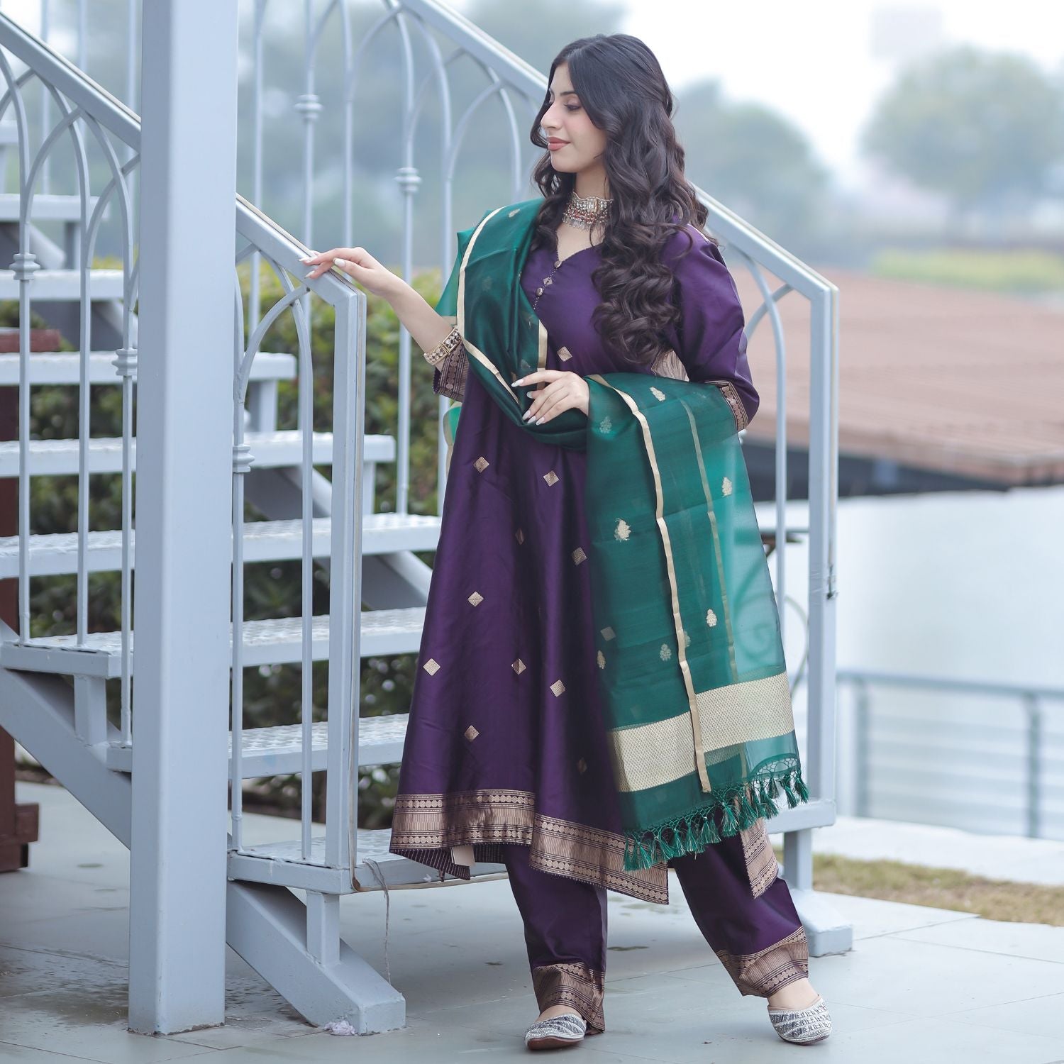 Banarasi silk suit with green kora dupatta and traditional woven pattern