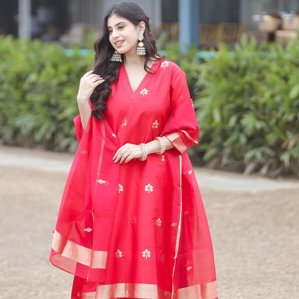 Banarasi silk suit with detailed nakashi boota pattern and rich fabric