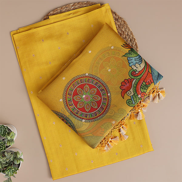 Close-up shot of the rich handwoven texture of the golden yellow Banarasi silk fabric alongside the intricate floral motifs on the Kalamkari organza dupatta.