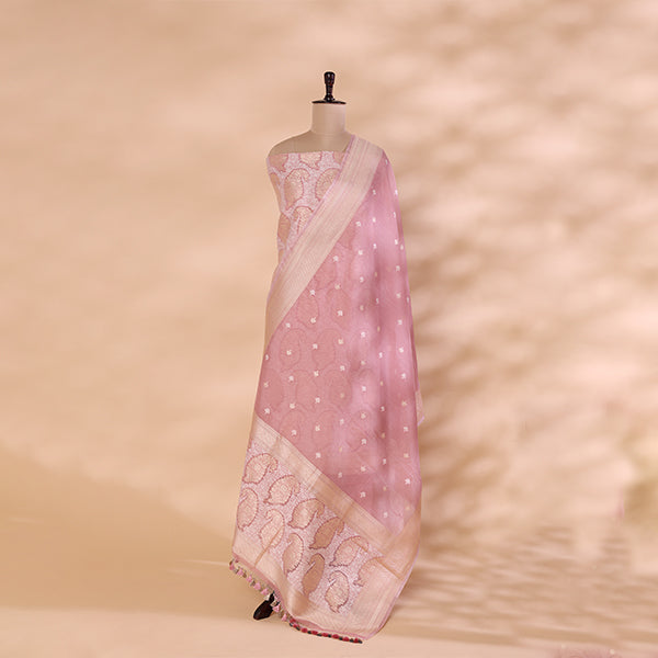 Close-up look at a soft blush pink Banarasi cotton silk suit with detailed white Resham weaving.
