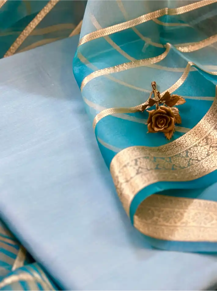 Full length view of the unstitched luxury Chanderi cotton silk dress material alongside the artistic, multi-colored Rangkaat Kora dupatta.
