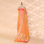Close-up view of the copper yellow handwoven silk dupatta highlighting the delicate silver border accents and elegant craftsmanship.