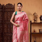 Detailed view of the heavy gold zari pallu on the Crimson Shikargah Splendor Katan silk saree, highlighting its regal look.