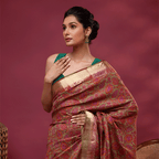 Model wearing the Enchanted Aurora Silk Saree made of pure China silk featuring twilight purple and gold digital prints with a green sleeveless blouse.