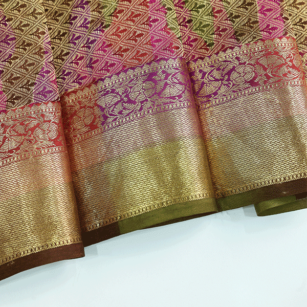 Flat lay of the unstitched full Jaal zari border blouse fabric included with the Enchanted Aurora Silk Saree.