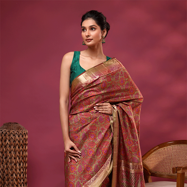 Full-length view of the Enchanted Aurora pure silk saree showcasing the intricate pattern drape and gold zari borders.