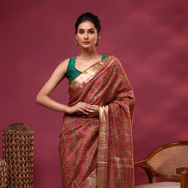 Back view of the Enchanted Aurora silk saree highlighting the detailed pallu and elegant drape design.