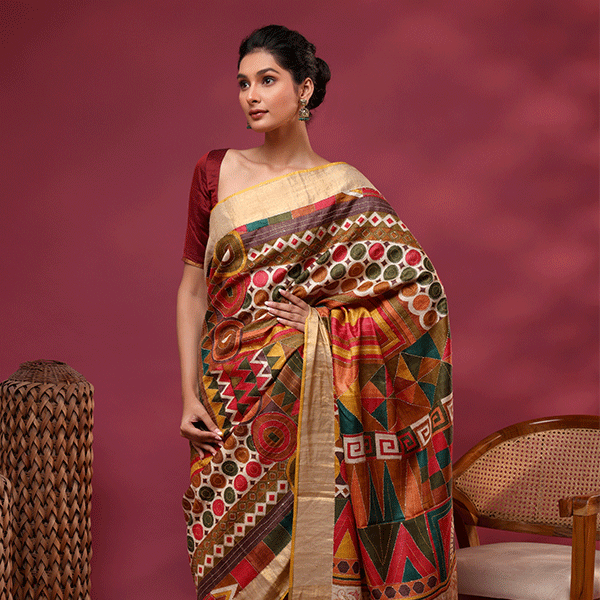 Full back view of the traditional Ethereal Harmony Tussar silk saree showcasing its graceful drape and matching embroidery borders.