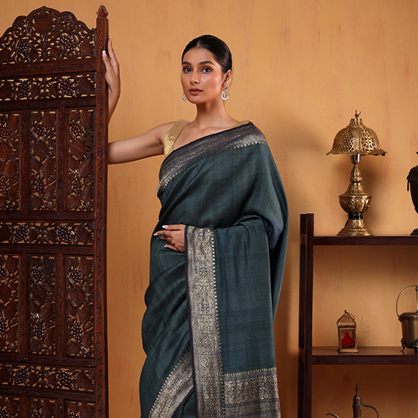 Close-up view of the pure Khadi Tussar fabric texture highlighting the seamless multicolored gradient and intricate circle patterns.