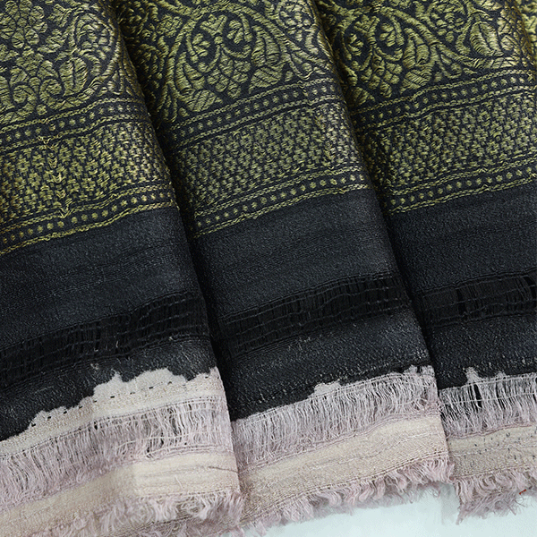 Detailed shot of the elegant pallu on the Ethereal Ombre Tussar saree featuring traditional Banarasi craftsmanship and gold zari work.