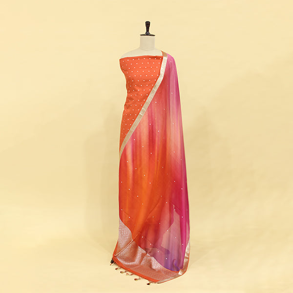 Full view of the enchanting ombre dupatta showcasing a seamless blend of vibrant fiery red and pink hues with golden borders.