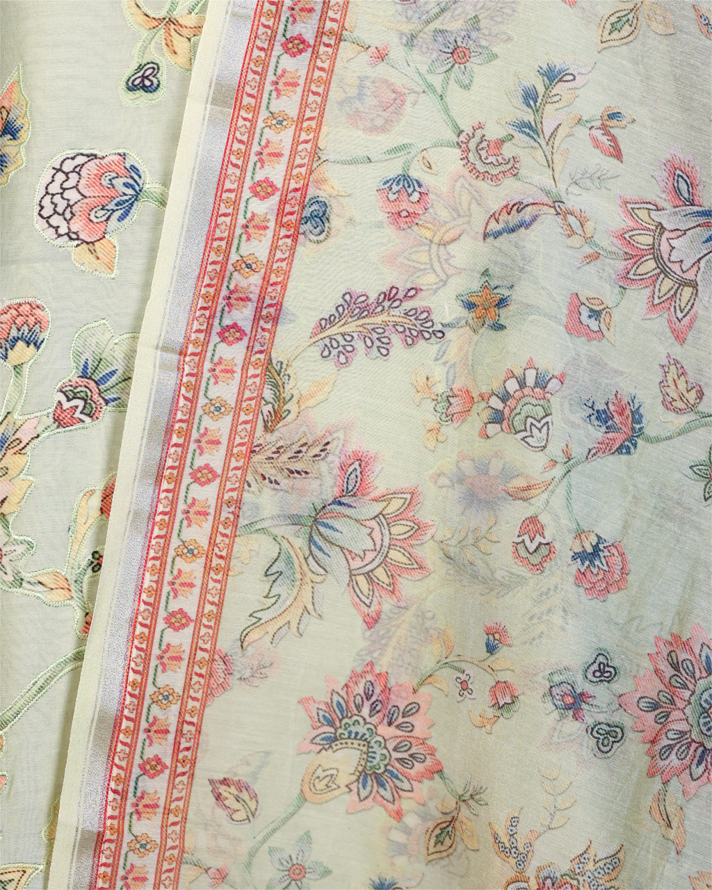 A close-up view of premium, handwoven silk fabric featuring intricate gold zari weaving, showcasing the luxurious texture and authentic craftsmanship.