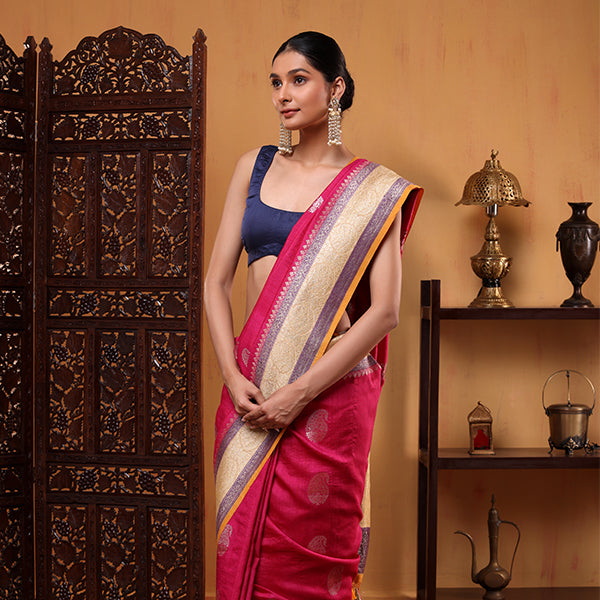 Macro shot of the luxurious pure Tussar Georgette silk fabric weave of the Fuchsia Blossom festive saree.