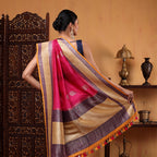 Back view of the Raspberry Blush Fuchsia Blossom silk saree showcasing its graceful, flowy drape and traditional Banaras craftsmanship.