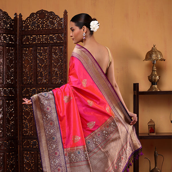 One meter unstitched pure silk blouse piece with a matching gold zari border for the Fuchsia Fantasy saree.