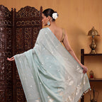 Close-up of the 1-meter unstitched blouse material featuring a premium full zari border accompanying the Banarasi cotton saree.