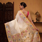 Front drape view of the Celestial Charm saree highlighting the intricate handwoven Jaamdani pleats and elegant gold borders.