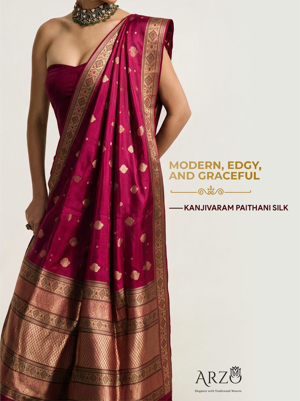 Studio portrait of a model wearing a magenta-pink handwoven Kanjivaram Paithani silk saree with a wide gold zari border, styled with a statement choker necklace. Overlay text reads "MODERN, EDGY, AND GRACEFUL - KANJIVARAM PAITHANI SILK", with the Arzo brand logo at the bottom.