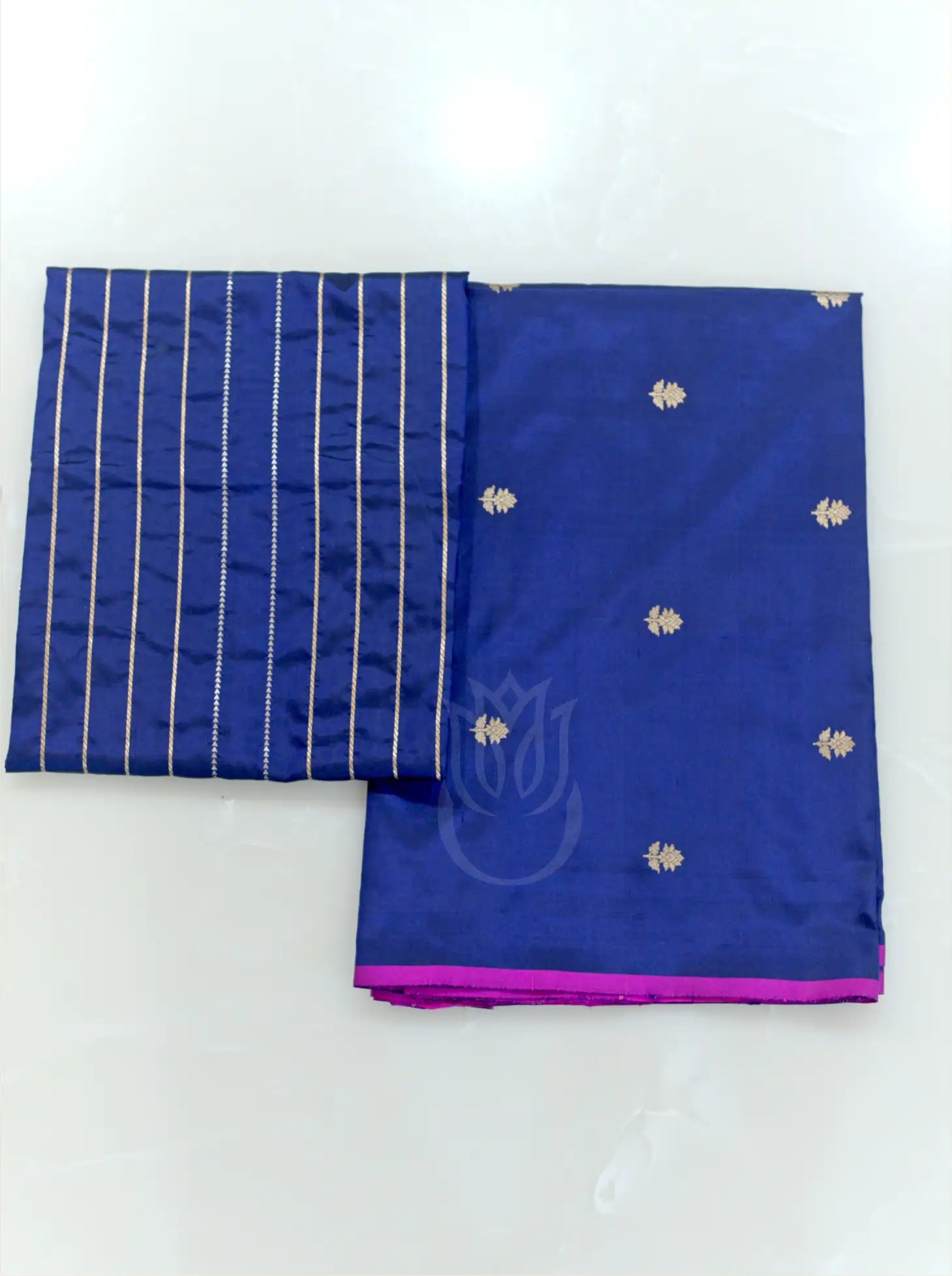 Royal blue handwoven Kora Katan silk unstitched suit fabric with silver zari floral bootis, magenta border, and matching gold striped dupatta.
