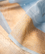 Handwoven Kora silk suit with rich zari weaving, lightweight premium festive wear for weddings and special occasions