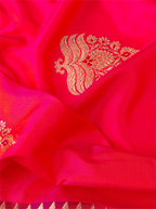 Close-up view of the pallu and border design on a handwoven red pure Katan silk saree showcasing rich gold zari handloom work.