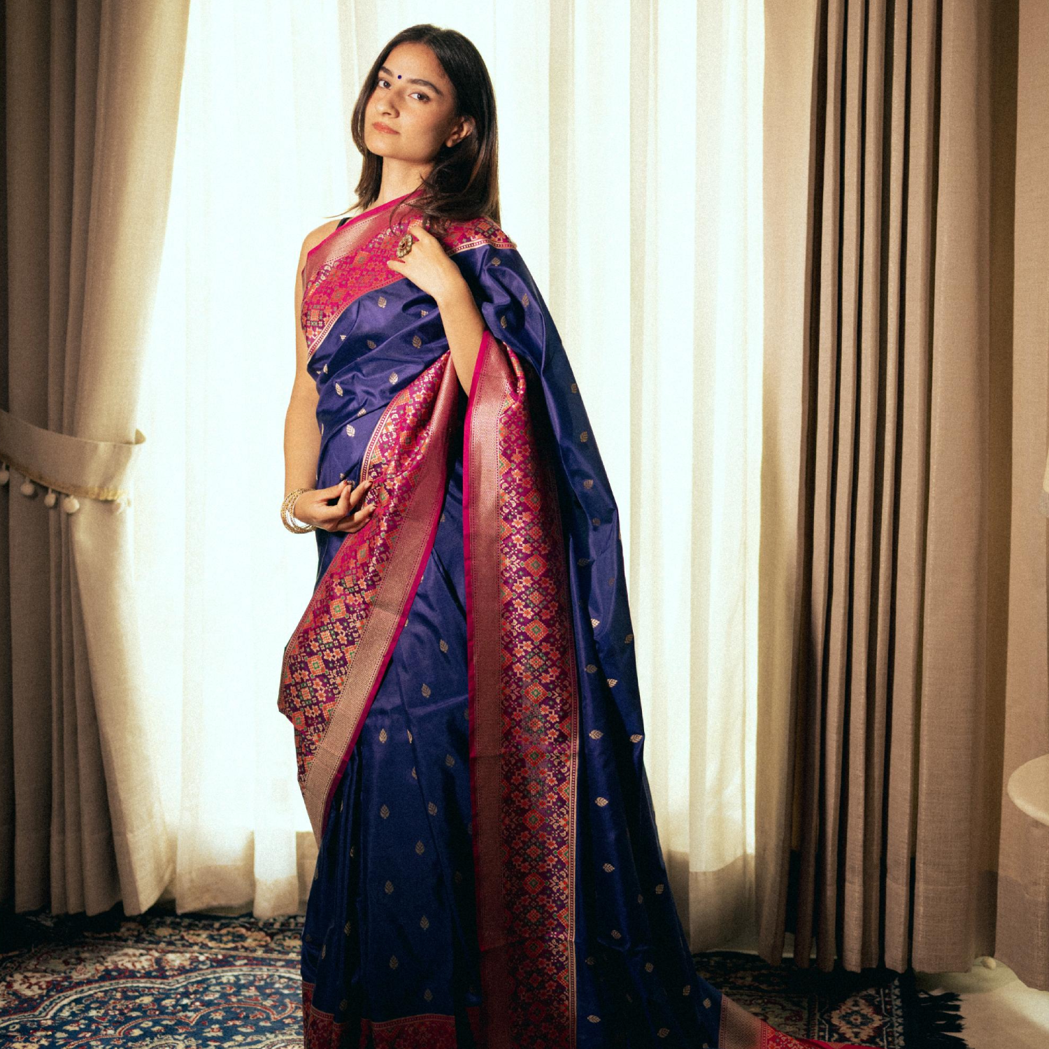 Handwoven Banarasi Silk Patola Pallu And Heavy Border Contrast Fuchsia Blouse