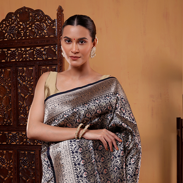 Side profile view of the handwoven Indigo Golden Shikargah Majesty saree showcasing the elegant pleat flow and drape consistency.