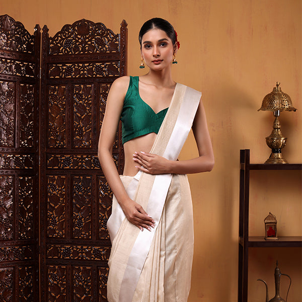 Close-up shot highlighting the premium natural texture, authentic weave, and white satin border of the handwoven pure Munga silk saree.