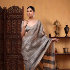 Detailed view of the matching unstitched full-striped blouse material included with the Ivory Elegance pure Tussar silk saree.