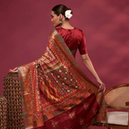 Detailed view of the striped unstitched blouse material with a Kantha embroidery border included with the Tussar silk saree.