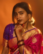 Full-length view of the handwoven Kanjivaram silk saree showcasing the contrast border and drape
