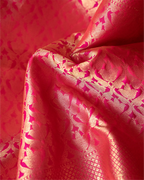 Elegant drape view of a premium black and red Kanjivaram silk saree.