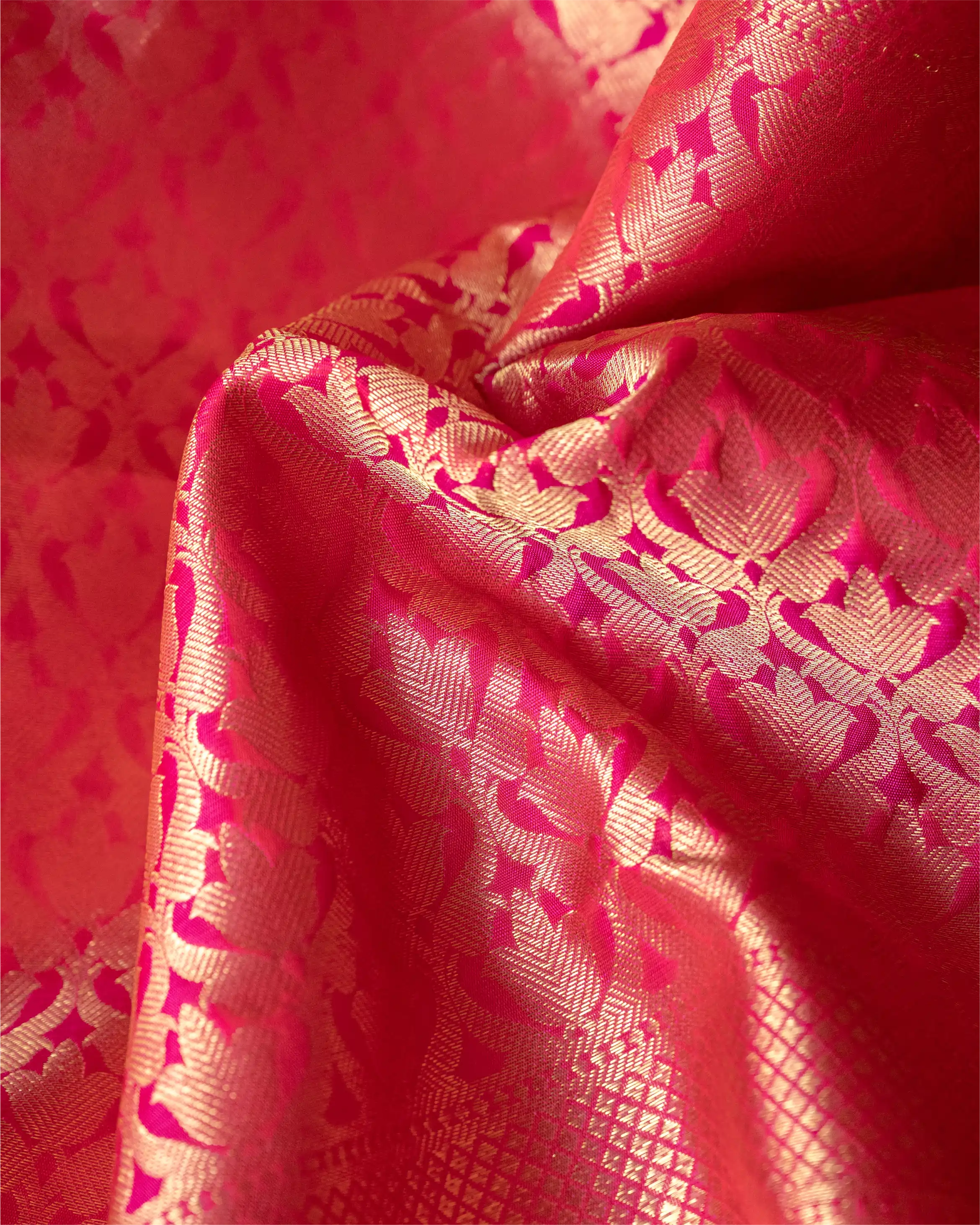 Elegant drape view of a premium black and red Kanjivaram silk saree.