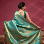 Close-up of the 1-meter unstitched blouse fabric featuring a premium handwoven self Jaal pattern and gold zari border.