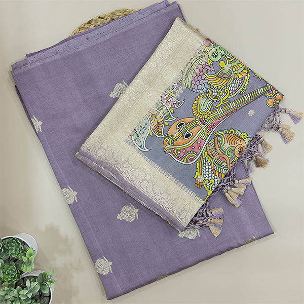 Close-up shot of the intricate handwoven pure Banarasi silk fabric pattern and the detailed Kalamkari symphony dupatta print.