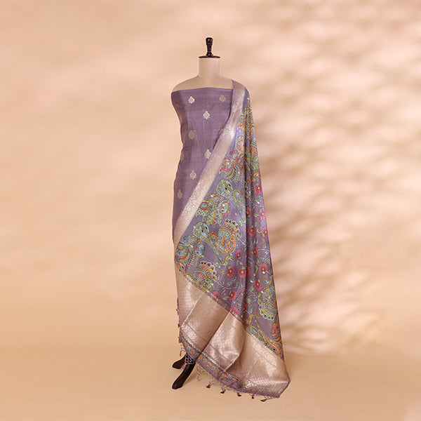 Side view of the unstitched lavender pure Banarasi silk dress material and draped digital Kalamkari dupatta on a mannequin.