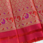 Full-length studio shot of the elegant Majestic Magenta silk saree, showing a regal drape perfect for weddings, pujas, and festive celebrations.