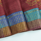 Full-length studio shot of the handwoven maroon Kantha Tussar silk saree, styled elegantly for festive and wedding occasions.