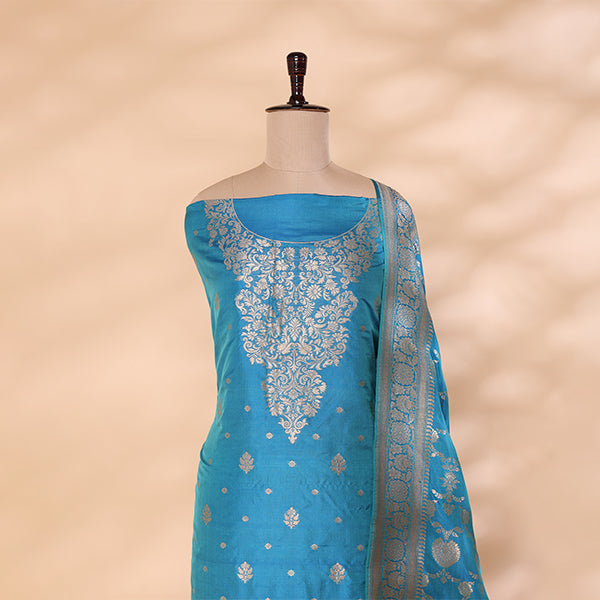 Detailed look at the matching aqua blue pure Banarasi silk dupatta, highlighting its premium handwoven texture, traditional borders, and luxurious drape.